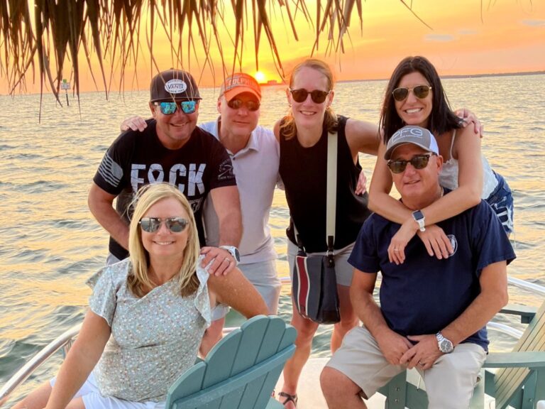 Nautical Tiki Cruises | Group enjoying a beautiful sunset on a tiki boat | Fort Myers Beach