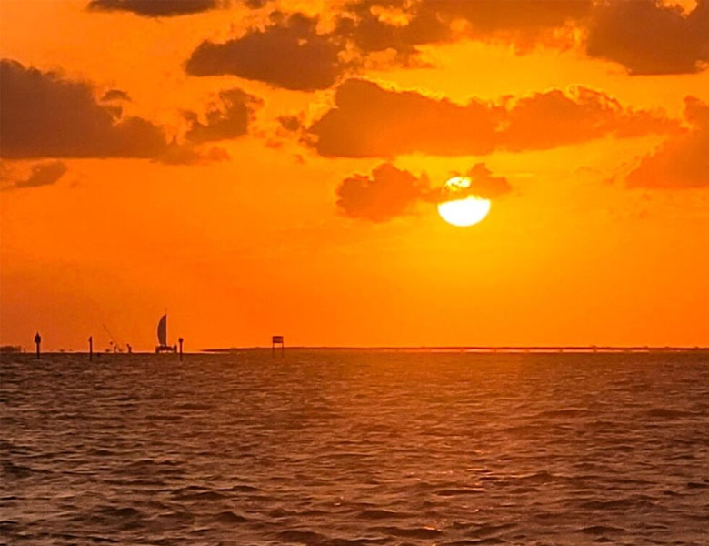 Southwest Florida golden sunset aboard a Nautical Tiki Cruise.