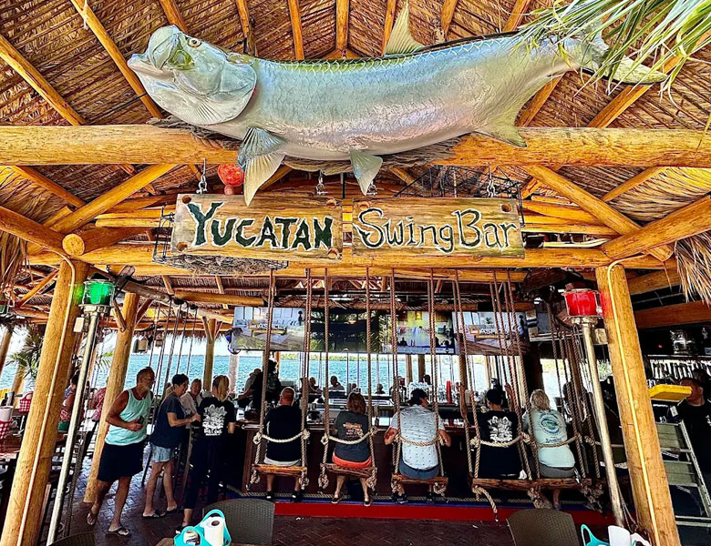 Yucatan Restaurant Swing Bar. Join Nautical Tiki Cruises for a tiki boat tour.