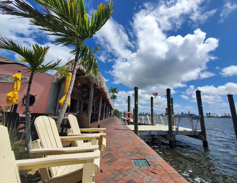 Nautical Tiki Cruises docks at the Yucatan Waterfont Restaurant. Join us for a sunset cruise.